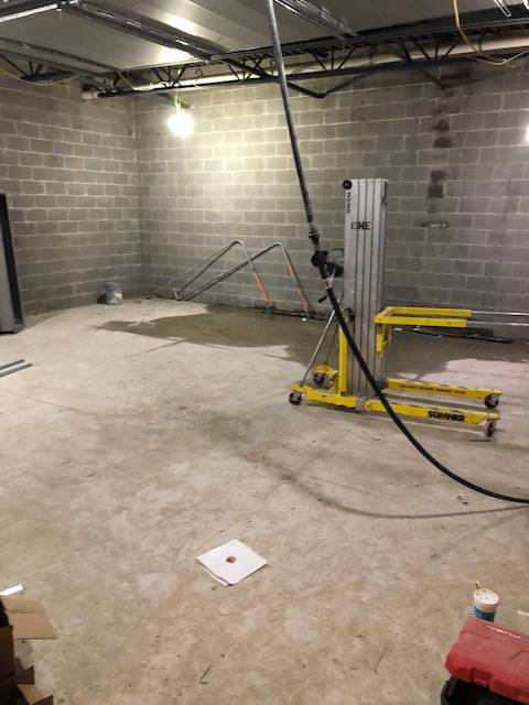 More construction inside of the Jamie Hosford Football Center.